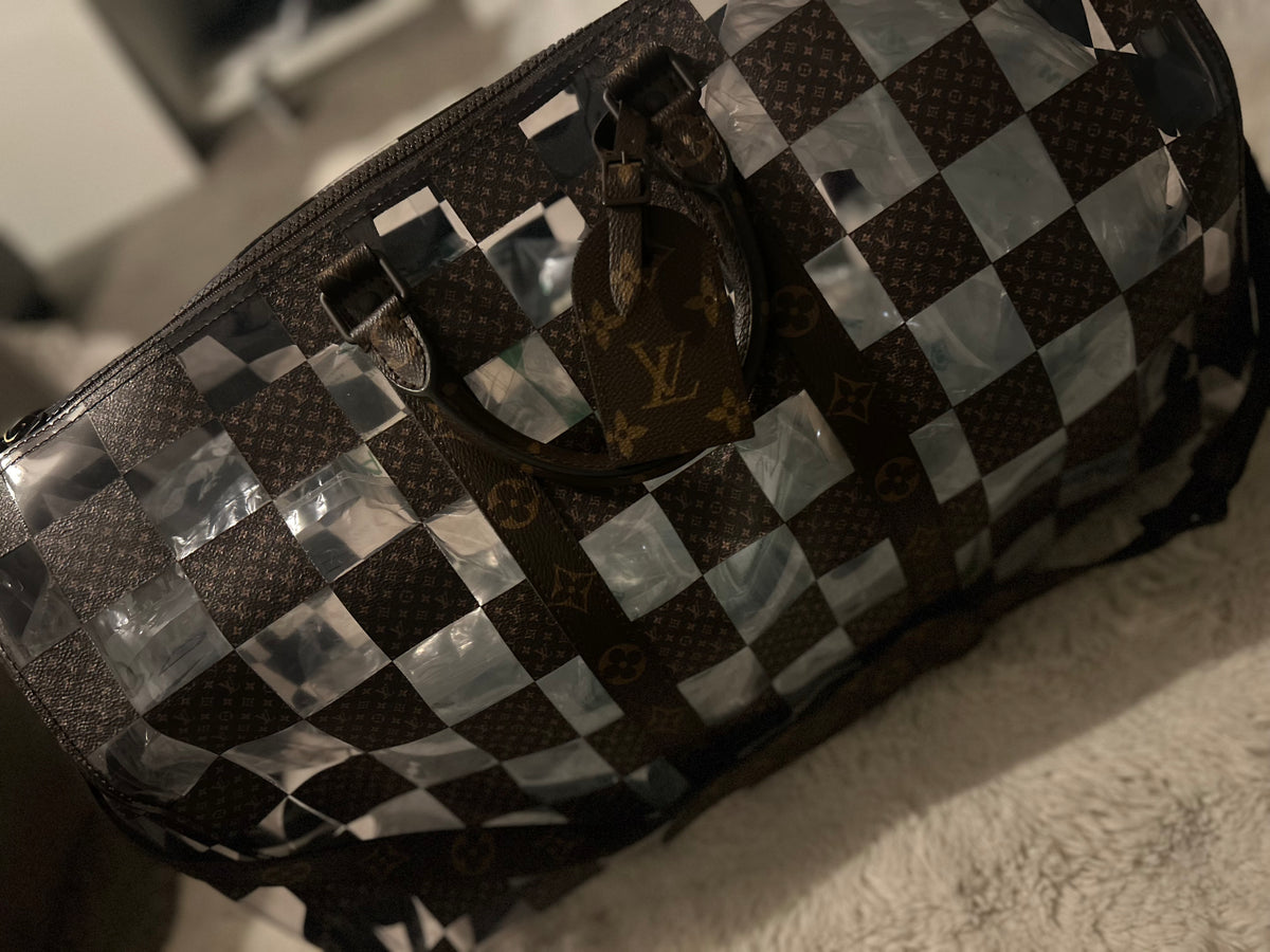 Louis Vuitton travel bag monogram chess hold-all